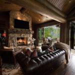 Arrowhead-custom-log-sun-room-with-weiland-bifold-doors