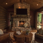 Arrowhead-custom-rustic-fireplace-with-rustic-log-mantle