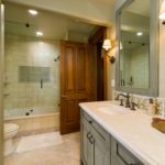 Vail-Mountain-Elegant-jack-and-jill-bathroom-with-custom-tile-and-cabniets
